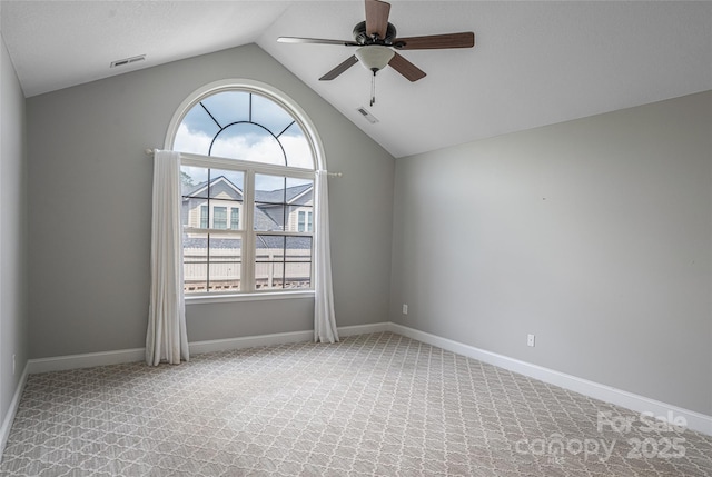 33 Braeburn Way, Flat Rock, NC 28731 - carpeted spare room with a ceiling fan, a healthy amount of sunlight, visible vents, and vaulted ceiling