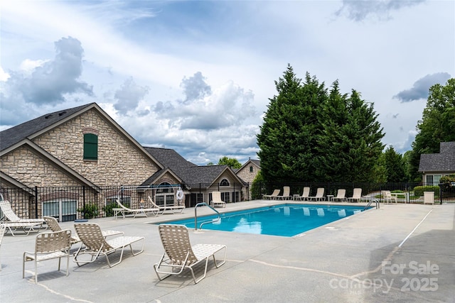 33 Braeburn Way, Flat Rock, NC 28731 - pool featuring fence and a patio area