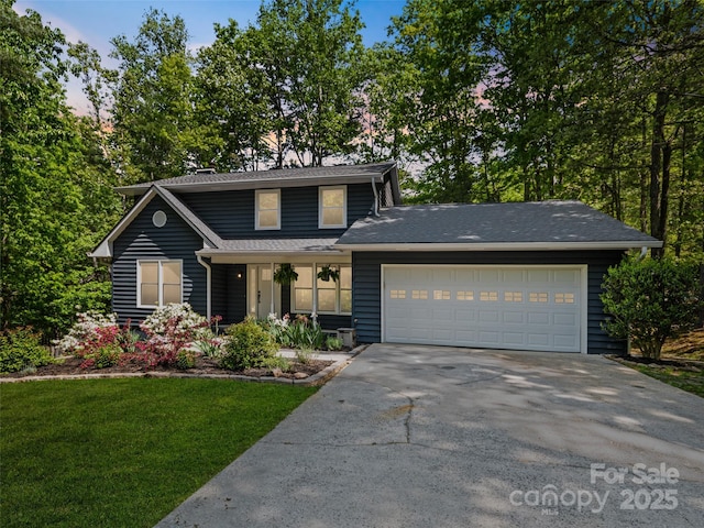 traditional-style house featuring asphalt driveway, an attached garage, a front lawn, a porch, and roof with shingles
