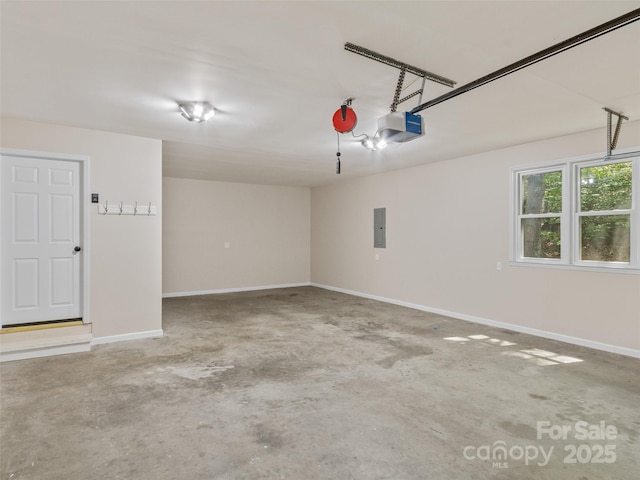 garage featuring a garage door opener, baseboards, and electric panel