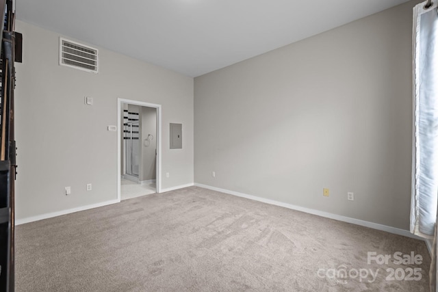 2125 Southend Dr Unit 448, Charlotte, NC 28203 - unfurnished bedroom featuring carpet flooring, baseboards, and electric panel