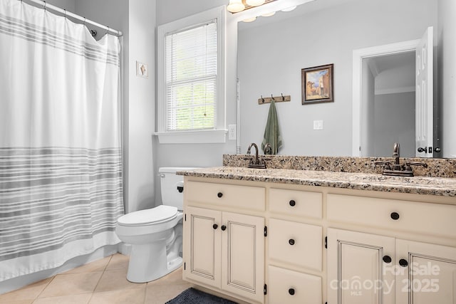 16028 Hallaton Dr, Huntersville, NC 28078 - full bathroom featuring tile patterned floors, double vanity, toilet, and a sink