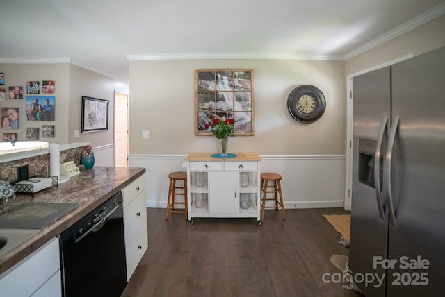 kitchen with ornamental molding, black dishwasher, stainless steel fridge with ice dispenser, dark wood-type flooring, and white cabinets