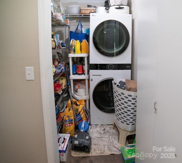 laundry room with laundry area and stacked washing maching and dryer