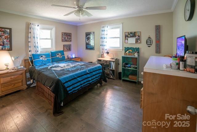 bedroom featuring multiple windows, crown molding, and dark wood-style floors