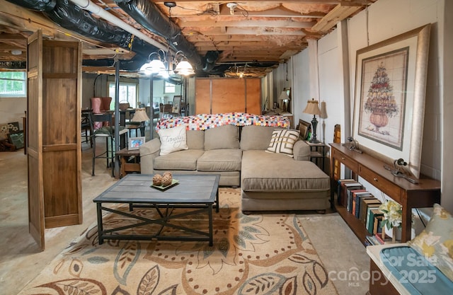 living area with concrete floors