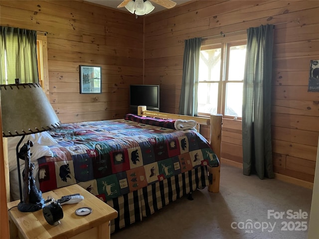 96 Trails End Ln, Maggie Valley, NC 28751 - bedroom featuring wood walls and carpet flooring