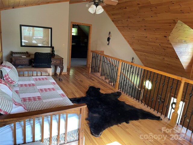 96 Trails End Ln, Maggie Valley, NC 28751 - living room featuring vaulted ceiling, wood ceiling, wood finished floors, a ceiling fan, and baseboards