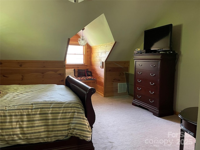 96 Trails End Ln, Maggie Valley, NC 28751 - carpeted bedroom featuring lofted ceiling and wooden walls