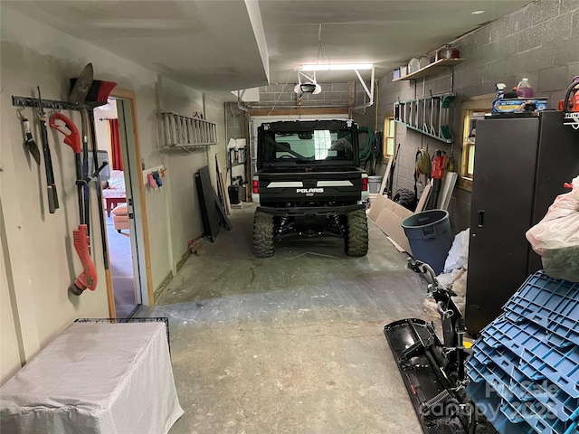 96 Trails End Ln, Maggie Valley, NC 28751 - garage with a garage door opener and concrete block wall