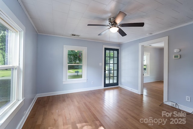 917 Laye St, Belmont, NC 28012 - spare room with wood finished floors, a ceiling fan, crown molding, and baseboards