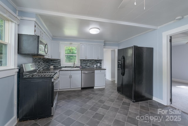 917 Laye St, Belmont, NC 28012 - kitchen featuring black fridge with ice dispenser, stainless steel dishwasher, gas range oven, a sink, and decorative backsplash