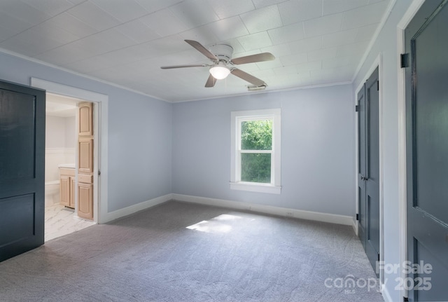 917 Laye St, Belmont, NC 28012 - unfurnished bedroom featuring light colored carpet, ornamental molding, baseboards, connected bathroom, and ceiling fan