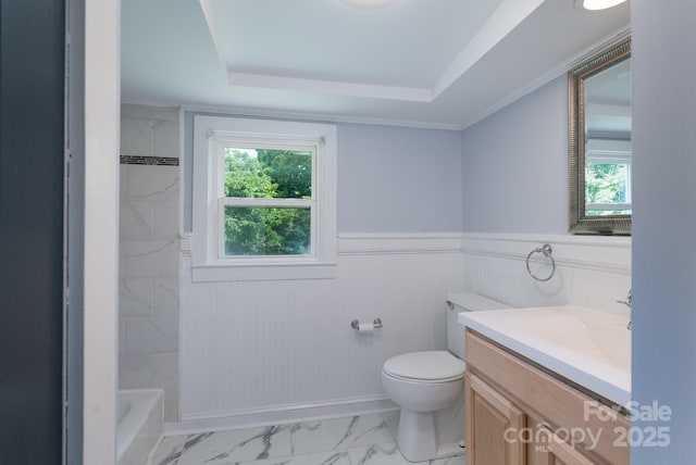917 Laye St, Belmont, NC 28012 - bathroom with plenty of natural light, marble look tiles, vanity, toilet, and a wainscoted wall