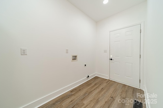 322 S Hill St, Gastonia, NC 28052 - laundry room with light wood finished floors, laundry area, washer hookup, hookup for an electric dryer, and baseboards