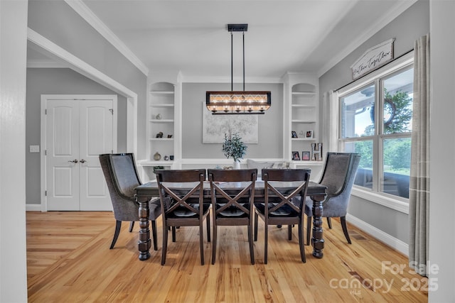 3440 17th Ave NE, Hickory, NC 28601 - dining space featuring built in features, wood finished floors, baseboards, and ornamental molding