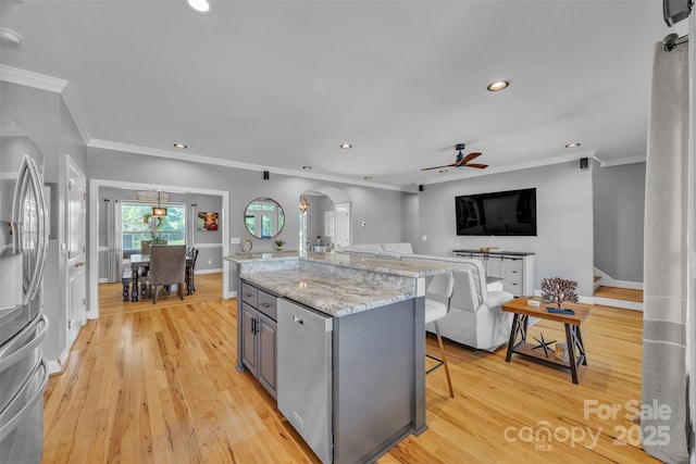 3440 17th Ave NE, Hickory, NC 28601 - kitchen with ceiling fan, arched walkways, gray cabinetry, appliances with stainless steel finishes, and recessed lighting