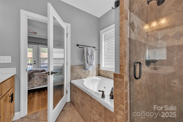 3440 17th Ave NE, Hickory, NC 28601 - bathroom with crown molding, french doors, a stall shower, and a bath