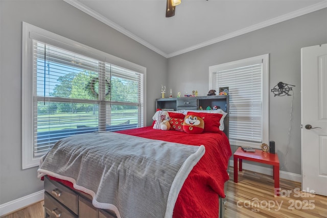 3440 17th Ave NE, Hickory, NC 28601 - bedroom featuring baseboards, crown molding, a ceiling fan, and wood finished floors