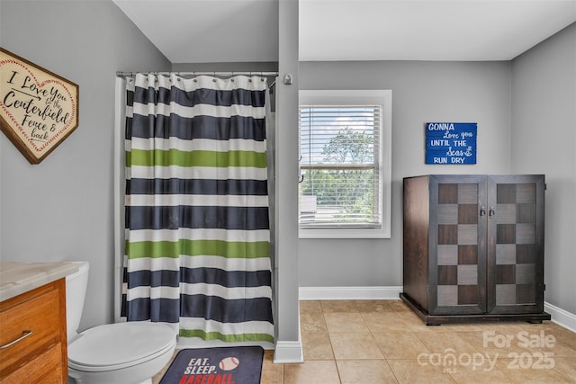 3440 17th Ave NE, Hickory, NC 28601 - bathroom featuring toilet, a shower with shower curtain, tile patterned flooring, baseboards, and vanity