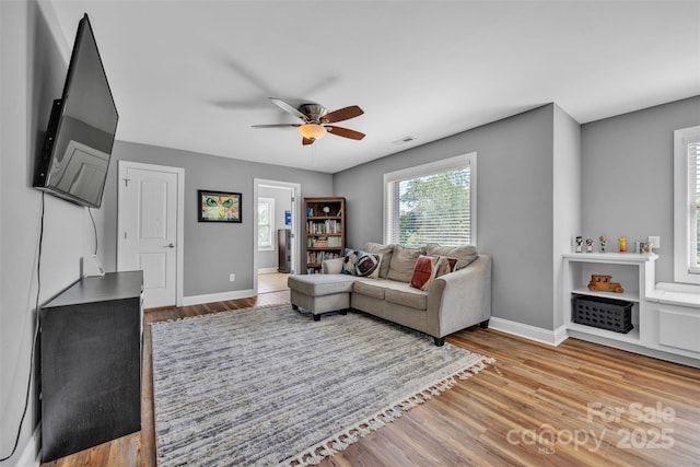 3440 17th Ave NE, Hickory, NC 28601 - living area featuring baseboards, a ceiling fan, visible vents, and wood finished floors