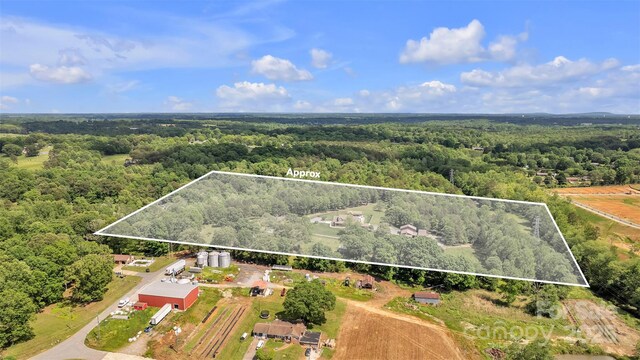 3440 17th Ave NE, Hickory, NC 28601 - drone / aerial view featuring a wooded view
