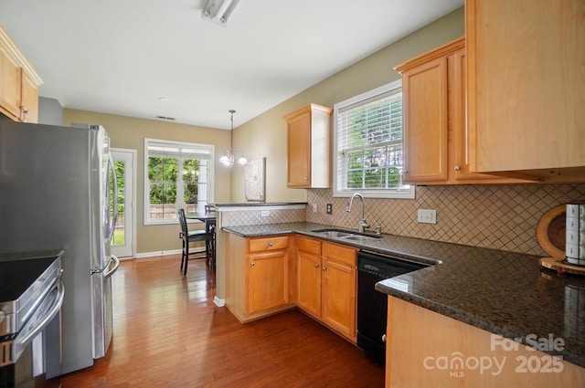 14402 Asheton Creek Dr, Charlotte, NC 28273 - kitchen featuring a sink, black dishwasher, dark wood-style flooring, stainless steel range with electric stovetop, and decorative backsplash