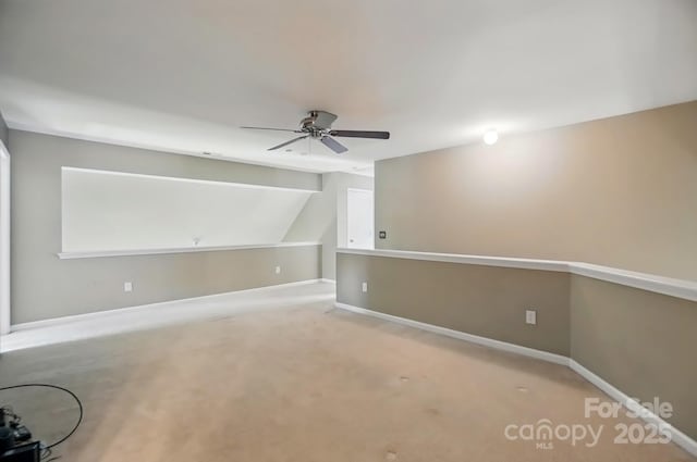 14402 Asheton Creek Dr, Charlotte, NC 28273 - carpeted spare room with a ceiling fan, baseboards, and vaulted ceiling