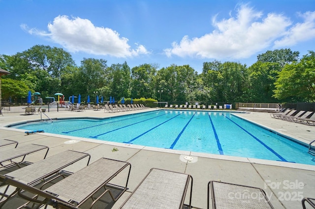 14402 Asheton Creek Dr, Charlotte, NC 28273 - community pool featuring fence and a patio