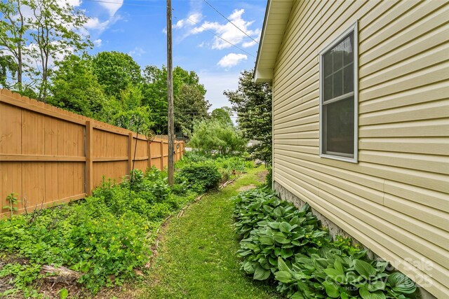 view of yard featuring fence