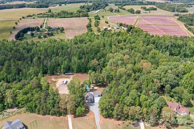 aerial view of property and surrounding area featuring rural landscape