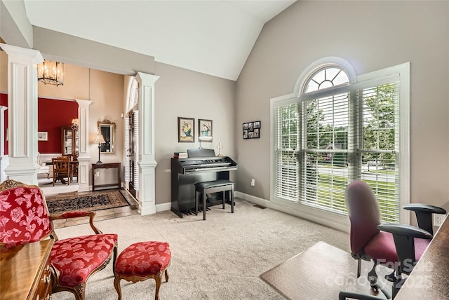 office area featuring ornate columns, high vaulted ceiling, and carpet