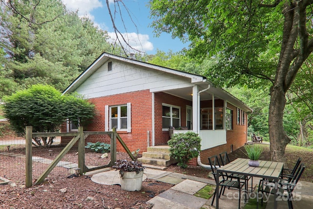 108 Patton Hill Rd, Swannanoa, NC 28778 - view of front of property with brick siding and outdoor dining space