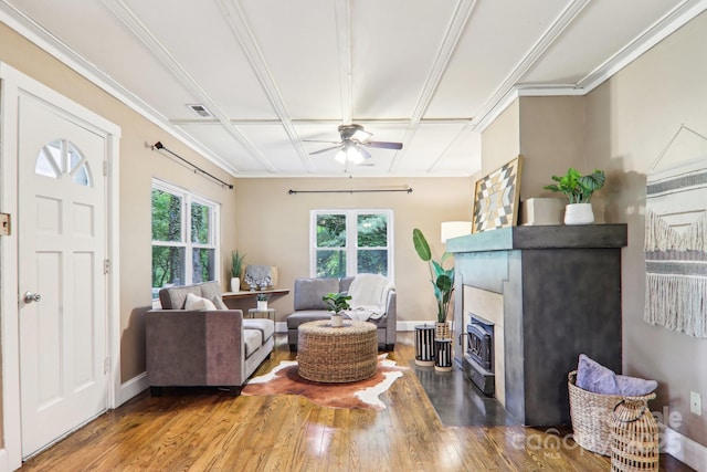 108 Patton Hill Rd, Swannanoa, NC 28778 - living area with ceiling fan, wood finished floors, a fireplace, baseboards, and crown molding