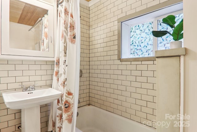 108 Patton Hill Rd, Swannanoa, NC 28778 - full bathroom with shower / bath combo with shower curtain, tasteful backsplash, and a sink
