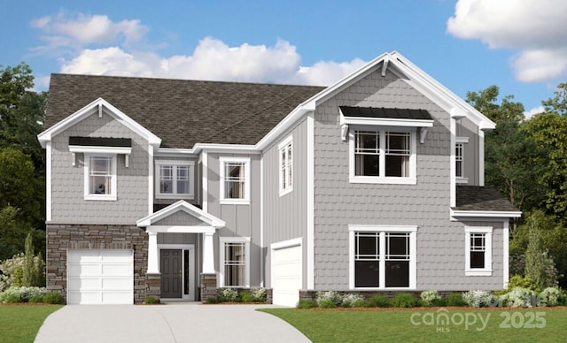 view of front of home featuring roof with shingles, stone siding, driveway, a garage, and a front yard