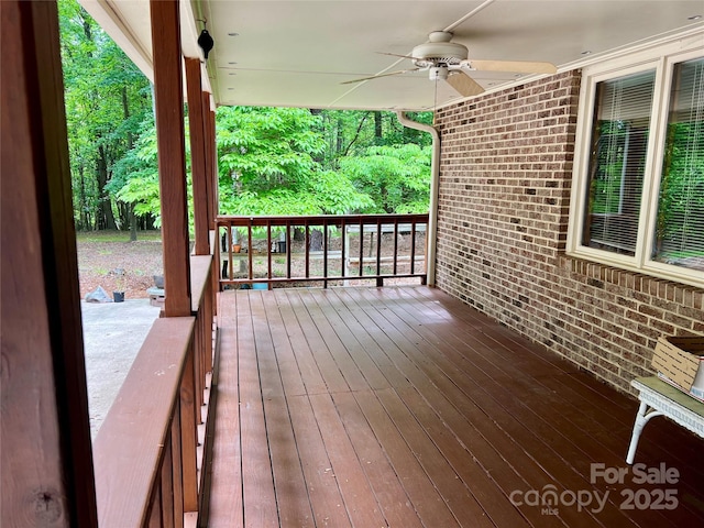 wooden deck with ceiling fan