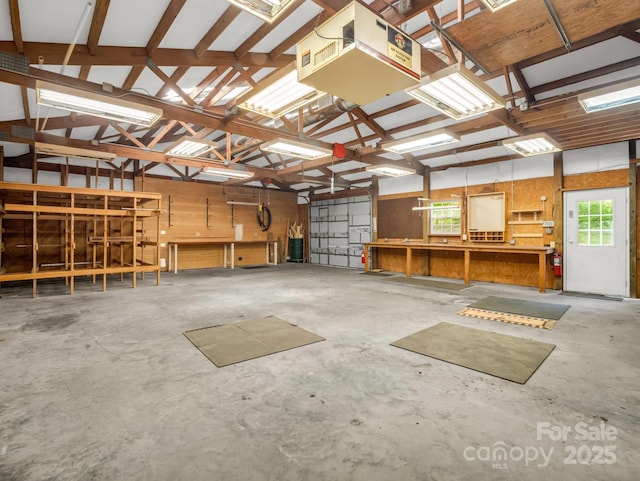 163 Summit Ln, Rutherfordton, NC 28139 - garage with a workshop area and a heating unit