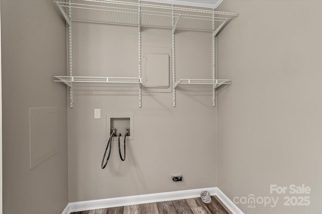 laundry room featuring baseboards, washer hookup, wood finished floors, and electric dryer hookup
