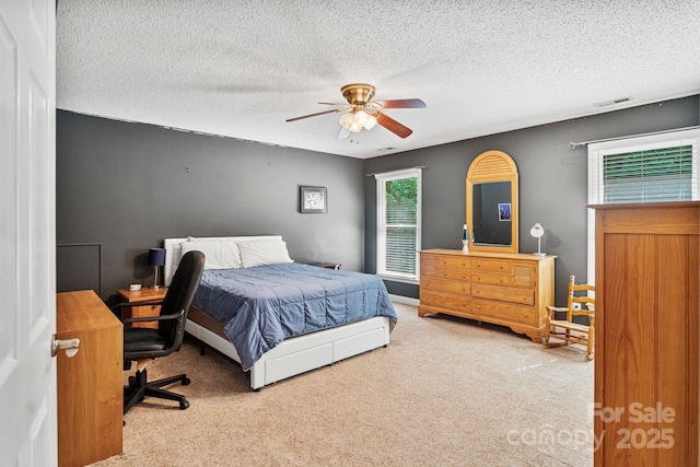 104 Belvedere Dr, Morganton, NC 28655 - bedroom featuring carpet floors, a textured ceiling, and ceiling fan
