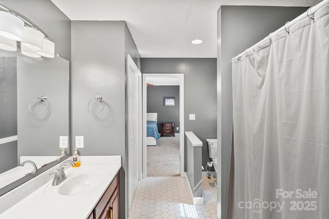 104 Belvedere Dr, Morganton, NC 28655 - full bathroom with toilet, vanity, and tile patterned flooring