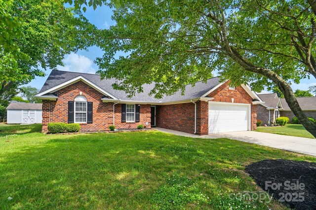 8309 Emily Dr, Harrisburg, NC 28075 - view of front facade with a garage, brick siding, a front lawn, and concrete driveway