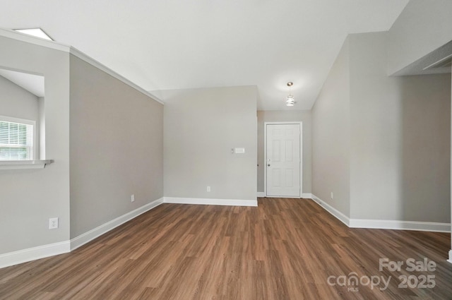 8309 Emily Dr, Harrisburg, NC 28075 - additional living space with wood finished floors, baseboards, and vaulted ceiling