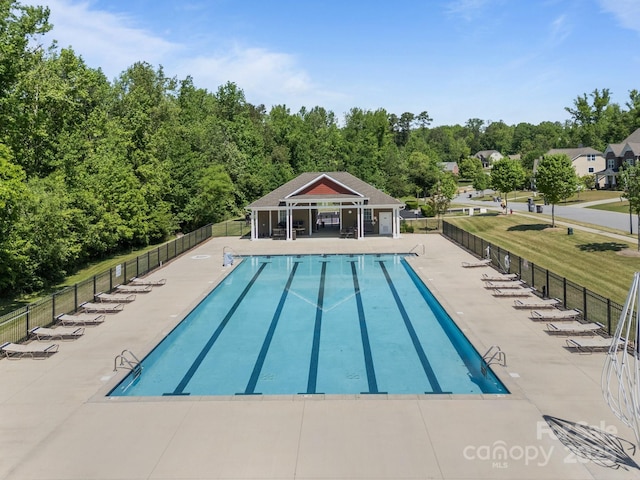 9871 Travertine Trl, Davidson, NC 28036 - community pool featuring a patio area