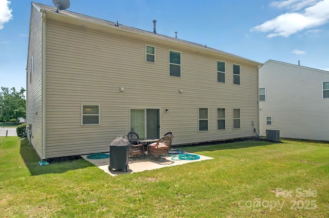 14837 Dungannon Ct, Charlotte, NC 28278 - back of house with central AC, a lawn, and a patio area