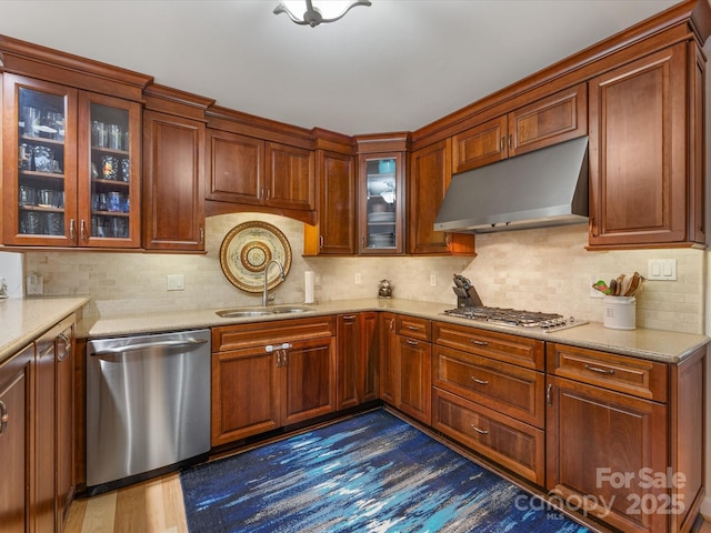 17501 Youngblood Rd, Charlotte, NC 28278 - kitchen featuring stainless steel appliances, under cabinet range hood, a sink, dark wood-type flooring, and tasteful backsplash