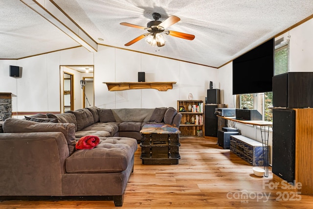 15 Robin Ln, Asheville, NC 28806 - living room with light wood-type flooring, a textured ceiling, a ceiling fan, and crown molding