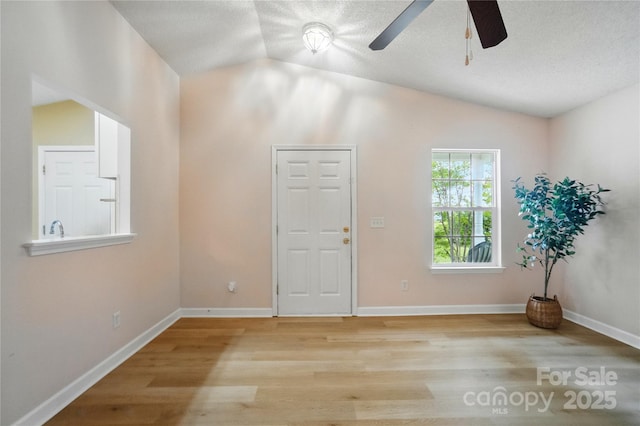 1162 Willet Dr, Rock Hill, SC 29732 - entrance foyer with vaulted ceiling, wood finished floors, a ceiling fan, a textured ceiling, and baseboards