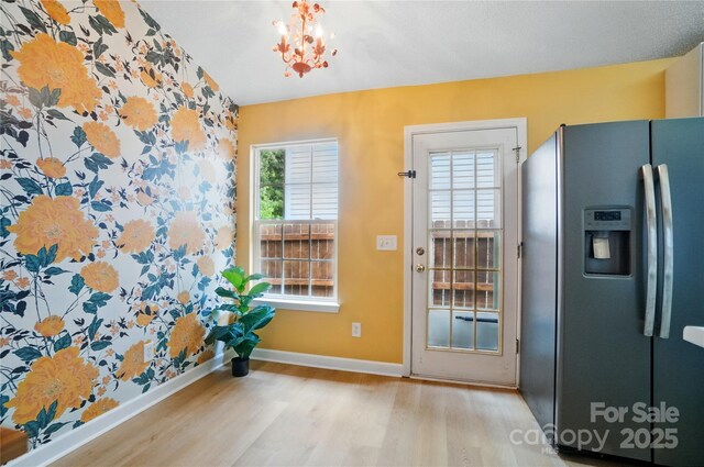 1162 Willet Dr, Rock Hill, SC 29732 - entryway with wood finished floors, baseboards, and a chandelier