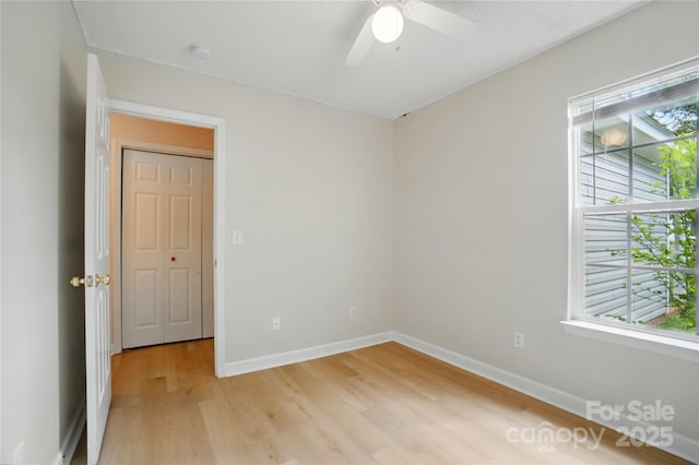 1162 Willet Dr, Rock Hill, SC 29732 - unfurnished room featuring light wood-style flooring, baseboards, a ceiling fan, and a smoke detector